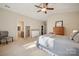 Bright primary bedroom with ensuite bathroom and walk-in closet access at 1622 Candlewood Ridge Ln, Matthews, NC 28105