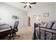 Cozy bedroom features a ceiling fan, a television, and neutral-toned walls, creating a serene atmosphere at 1622 Candlewood Ridge Ln, Matthews, NC 28105
