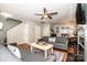 Spacious living room showcasing an open floor plan, hardwood floors, and a seamless flow to the dining area at 17307 Villanova Rd, Huntersville, NC 28078