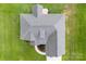 This aerial view displays a well maintained roof and manicured lawn surrounding the house at 210 Dorothy Dr, China Grove, NC 28023