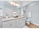 Bright bathroom featuring granite countertops, double sinks, and neutral walls at 210 Dorothy Dr, China Grove, NC 28023