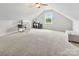 Bonus room featuring neutral carpet, attic ceilings and a view of the outdoors at 210 Dorothy Dr, China Grove, NC 28023