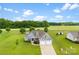 Charming single-story home with a two-car garage, well-manicured lawn, and inviting curb appeal at 210 Dorothy Dr, China Grove, NC 28023