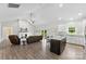 Open-concept kitchen and living area with vaulted ceilings and a cozy fireplace at 210 Dorothy Dr, China Grove, NC 28023