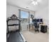 Home office/bedroom with a treadmill, desk setup, and natural light from the window at 234 Ascot Run Way, Fort Mill, SC 29715