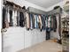Spacious walk-in closet with custom organizers, shelving, and drawers, ideal for efficient storage solutions at 234 Ascot Run Way, Fort Mill, SC 29715