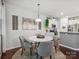 Cozy dining space with a marble table and kitchen view at 234 Ascot Run Way, Fort Mill, SC 29715