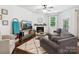 Inviting living room with a cozy fireplace, comfortable seating, and a bright window at 234 Ascot Run Way, Fort Mill, SC 29715