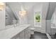 Bright bathroom features marble vanity top, large mirror and tiled shower at 2710 Briarcliff Pl, Charlotte, NC 28207