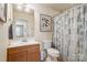Bathroom featuring modern fixtures, vanity, and a framed painting enhancing the bright interior's aesthetic appeal at 286 Liverpool Rd, Rock Hill, SC 29730