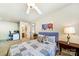 A charming bedroom featuring a ceiling fan, stylish decor, and a connecting bathroom for added convenience and privacy at 286 Liverpool Rd, Rock Hill, SC 29730