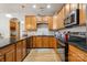Spacious kitchen featuring stainless steel appliances, granite countertops, and custom wood cabinetry at 286 Liverpool Rd, Rock Hill, SC 29730