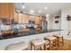 Modern kitchen with breakfast bar, stainless steel appliances, custom cabinets, and stylish light fixtures at 286 Liverpool Rd, Rock Hill, SC 29730