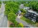 Aerial view showcasing the neighborhood, beautiful landscaping and charming blue exterior at 2915 Wesley Ave, Charlotte, NC 28205