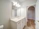 Bathroom featuring white vanity with chrome faucet, tiled floor and a view into another room at 3069 Founding Fathers Dr, Gastonia, NC 28056