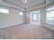 Versatile bonus room featuring neutral carpet, recessed lighting, and ample natural light at 3069 Founding Fathers Dr, Gastonia, NC 28056