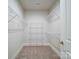 Walk-in closet featuring neutral walls, plush carpet, and four wire shelves to keep your items organized at 3069 Founding Fathers Dr, Gastonia, NC 28056