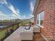 Stylish backyard patio featuring comfortable seating, a coffee table, and decorative landscaping for outdoor enjoyment at 3089 Founding Fathers Dr, Gastonia, NC 28056