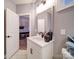 Well-lit bathroom featuring vanity with a modern sink and view into the other room at 3089 Founding Fathers Dr, Gastonia, NC 28056