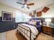 Charming bedroom with patriotic decor, a ceiling fan, and natural light at 3089 Founding Fathers Dr, Gastonia, NC 28056