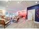 Open-concept design center features a lounge area, work space, and design samples against navy and white walls at 3089 Founding Fathers Dr, Gastonia, NC 28056