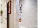 This walk-in shower offers sleek marble-like tiling and modern fixtures at 3089 Founding Fathers Dr, Gastonia, NC 28056