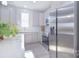 Well-lit kitchen with modern appliances, light gray cabinets, and ample counter space for cooking at 325 Cornwall Dr, Salisbury, NC 28147