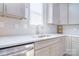Bright kitchen detail showcasing the sink, faucet, countertop, and cabinet finishes at 325 Cornwall Dr, Salisbury, NC 28147