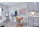 Bright living space featuring modern gray cabinets, TV and natural lighting at 325 Cornwall Dr, Salisbury, NC 28147