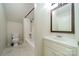 Small bathroom features a tub/shower combo and a vanity with a large mirror at 3387 Passmore Rd, Rock Hill, SC 29730