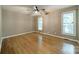 Bedroom with hardwood flooring, natural light, and neutral wall paint at 3387 Passmore Rd, Rock Hill, SC 29730