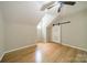 Bedroom showcasing a ceiling fan and a decorative, sliding barn door for closet access at 3387 Passmore Rd, Rock Hill, SC 29730