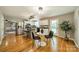 Modern kitchen with stainless steel appliances, white cabinets, and an island with barstools at 3387 Passmore Rd, Rock Hill, SC 29730
