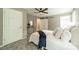 Bright main bedroom with a ceiling fan, carpet flooring, and natural lighting at 3387 Passmore Rd, Rock Hill, SC 29730