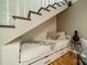Cozy bed nook with drawers built underneath the stairs, featuring stylish decor at 3387 Passmore Rd, Rock Hill, SC 29730