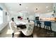 Well-lit dining area connected to the kitchen, featuring modern lighting and stylish decor at 3670 9Th Street Ne Dr # 96, Hickory, NC 28601