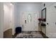 Inviting home foyer with a decorative door, accent furniture, and a stylish rug at 3670 9Th Street Ne Dr # 96, Hickory, NC 28601