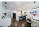 Open-concept kitchen with a center island, bar seating, and a dining area at 3670 9Th Street Ne Dr # 96, Hickory, NC 28601