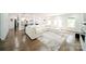 Spacious living room featuring hardwood floors, a comfortable sectional sofa, and neutral colors at 3670 9Th Street Ne Dr # 96, Hickory, NC 28601