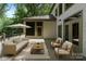 A spacious backyard deck is perfect for relaxing and entertaining while overlooking the natural surroundings at 3932 Rounding Run Rd, Charlotte, NC 28277