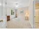 Bright bedroom featuring neutral striped wallpaper, a ceiling fan, and a window offering natural light at 3932 Rounding Run Rd, Charlotte, NC 28277