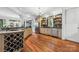 Stylish kitchen with custom cabinetry, stainless steel appliances, and wine storage at 3932 Rounding Run Rd, Charlotte, NC 28277