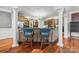 Elegant kitchen with island seating, granite countertops, and custom details at 3932 Rounding Run Rd, Charlotte, NC 28277