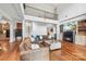 Spacious living room with a cozy fireplace, second story balcony, and an open layout perfect for entertaining at 3932 Rounding Run Rd, Charlotte, NC 28277