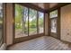 Covered patio area with shingle details and view of backyard at 3932 Rounding Run Rd, Charlotte, NC 28277