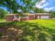 Charming brick home with lush lawn, front porch and ample parking at 40278 Nc 740 Hwy, New London, NC 28127