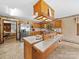 Spacious kitchen with island, wood cabinets, and modern appliances at 40278 Nc 740 Hwy, New London, NC 28127