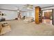A traditional-style living room with white walls and warm carpet at 40278 Nc 740 Hwy, New London, NC 28127