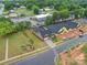 Aerial view highlighting a new home, landscaping, and outdoor firepit in a desirable community at 405 Newstyle Way, Gastonia, NC 28056