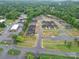 An aerial view of a neighborhood highlighting the homes and green trees around the community at 405 Newstyle Way, Gastonia, NC 28056